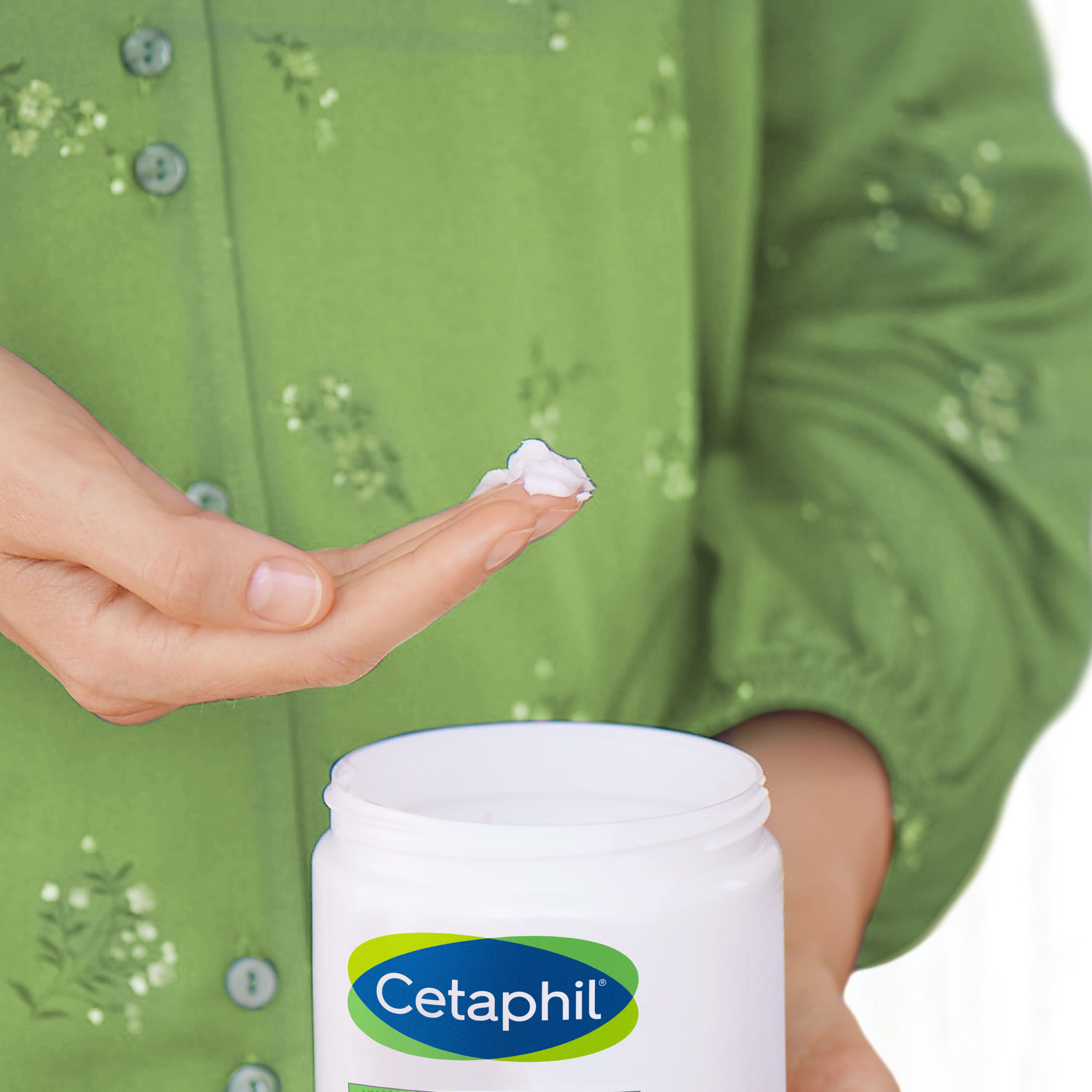 Applying Cetaphil moisturizing cream for dry & sensitive skin
